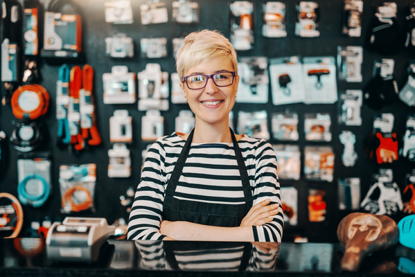 Retail employee in a bicycle shop; retail data security is a top concern for retail edge computing